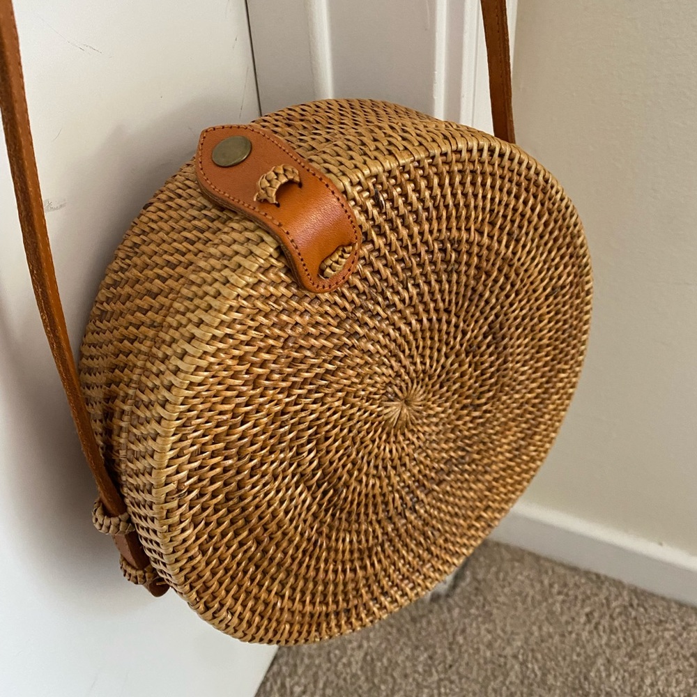 Handmade round rattan bag with leather strap